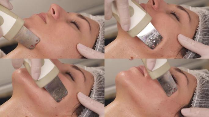 在美容办公室接受专业超声波设备清洁疗法的妇女的侧面特写视图。超声波皮肤脱皮