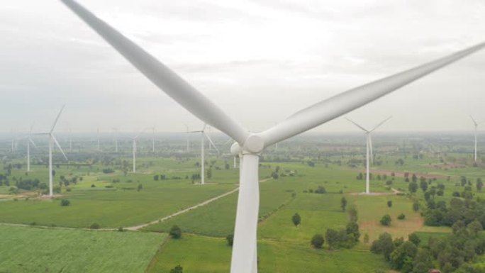 从空中看早晨的风力涡轮机-可持续发展，环境友好，可再生能源的概念。