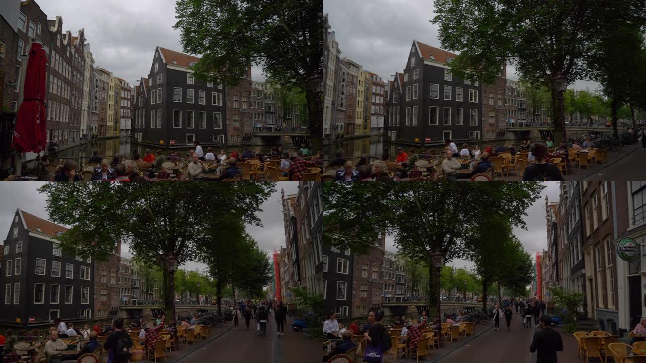 阿姆斯特丹城市日间著名运河街区拥挤餐厅慢动作全景4k荷兰