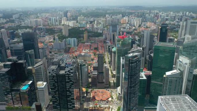 阳光灿烂的一天飞越新加坡市唐人街区空中全景4k