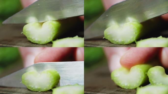 新鲜的芹菜碎成小块。