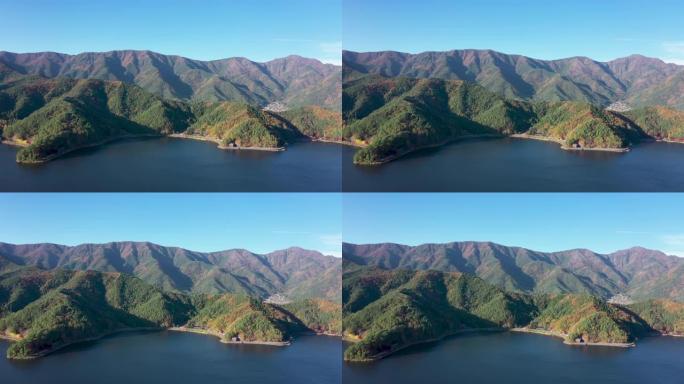 鸟瞰图4k视频，由美丽的日本秋季无人机在河口湖拍摄。