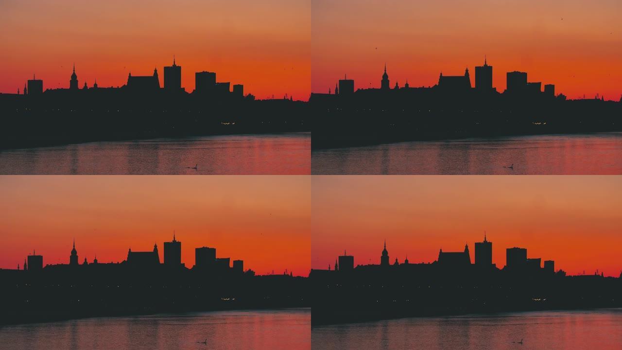 日落城市全景。河岸
