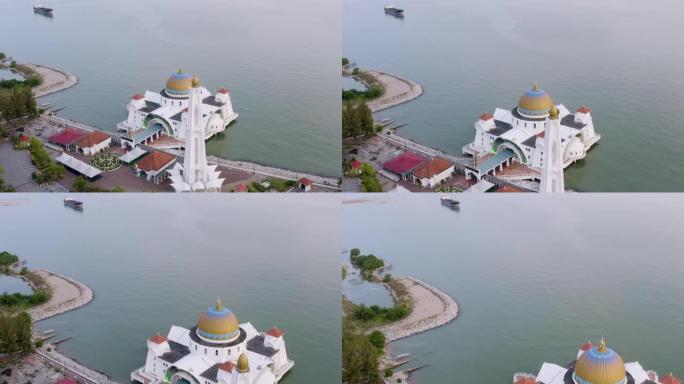空中无人机在日落时建立马六甲海峡浮动清真寺的b-roll镜头
