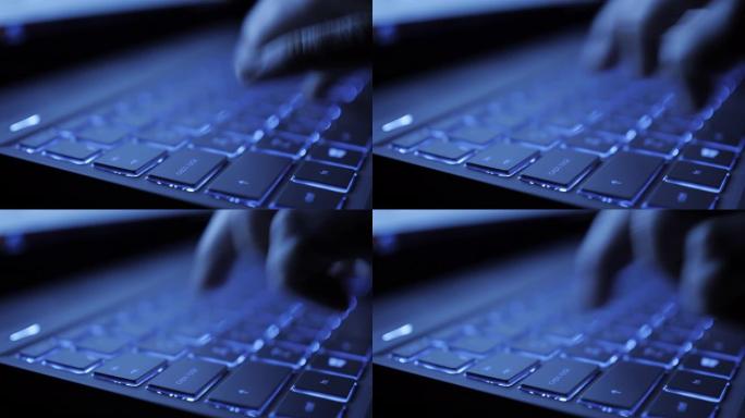 男人向社交网络写信息。电脑黑客键入代码病毒电脑在键盘上深夜工作。记者在媒体上写文章。在笔记本电脑上工