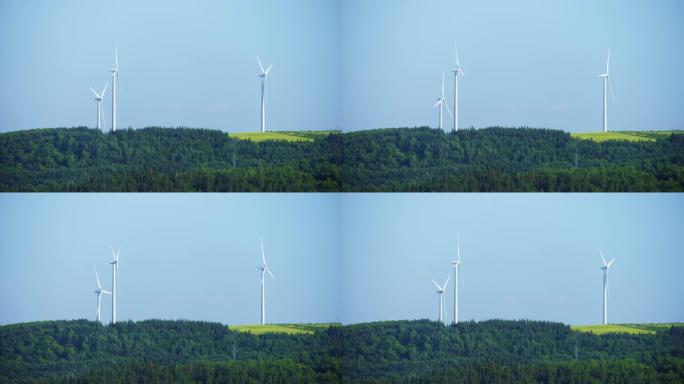 山顶的风车涡轮机和电动挂架/Matane
