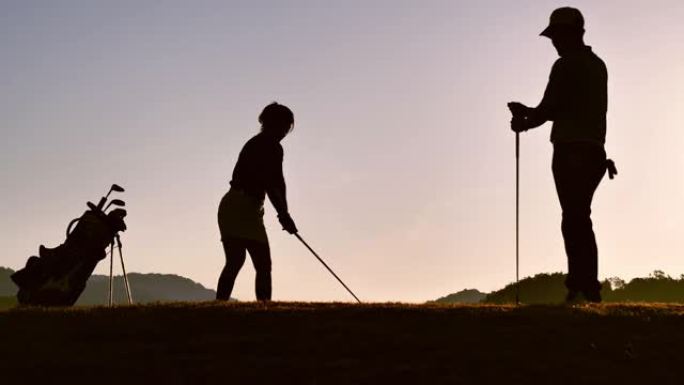 剪影高尔夫球手打扫和保持高尔夫球场在夏季放松时间，运动概念。
