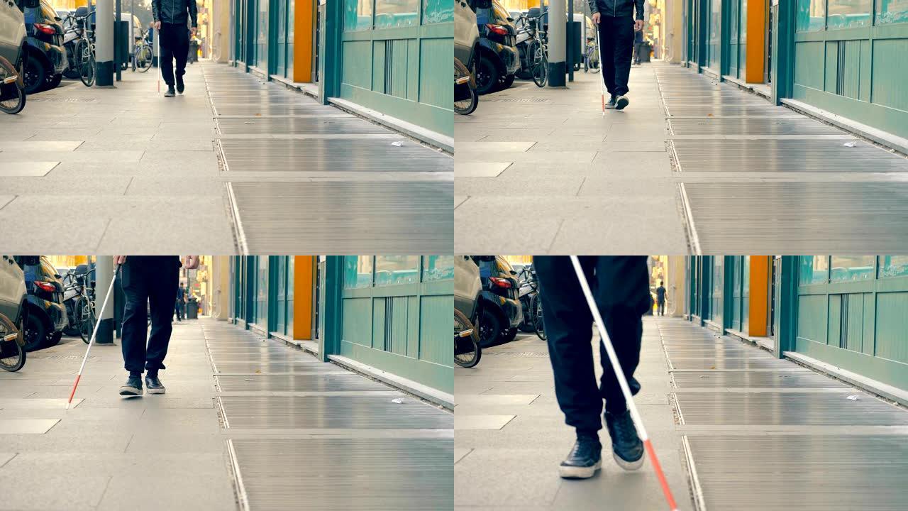 盲人在城市里行走。障碍、自治、独立