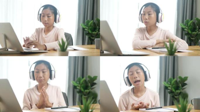 亚洲女性使用笔记本电脑在家工作，生活方式观念和新的正常观念。