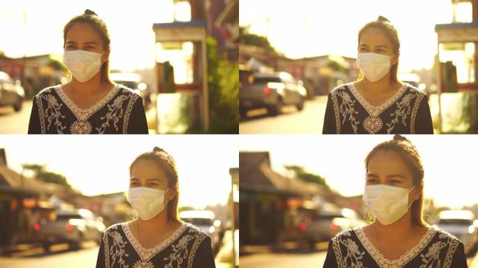 亚洲妇女戴着防尘口罩，PM 2.5和防病毒新型冠状病毒肺炎