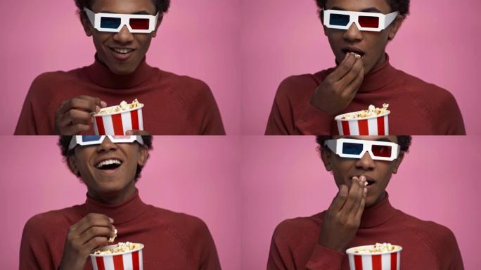 非裔美国少年在粉红色上看电影