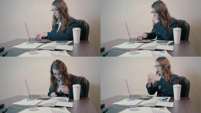 工作的年轻女性数据财务办公敲键盘打字笔记