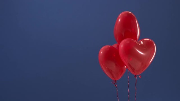 情人节或圣诞节礼物的装饰元素，色键上的红色心形气球。