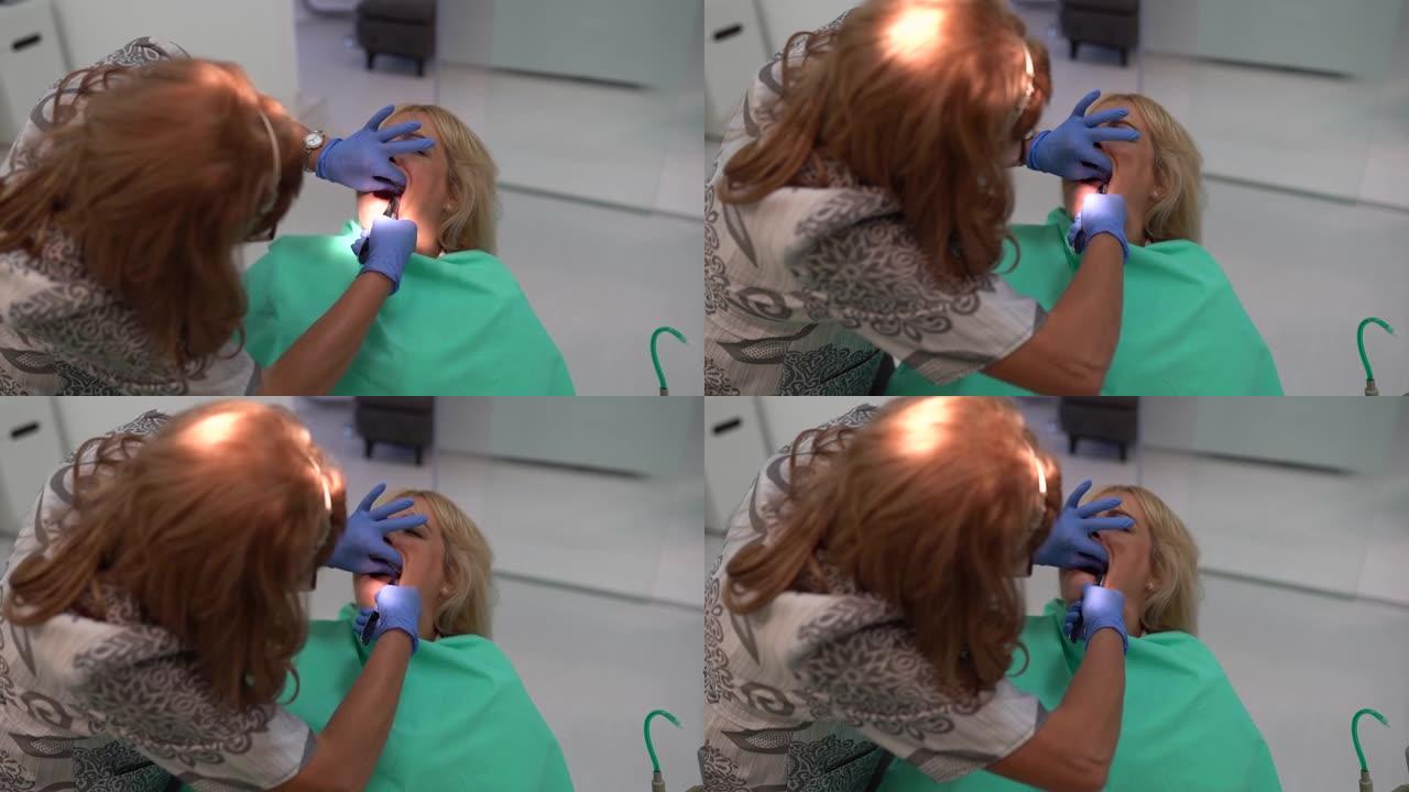 牙医拔掉病人的牙齿。