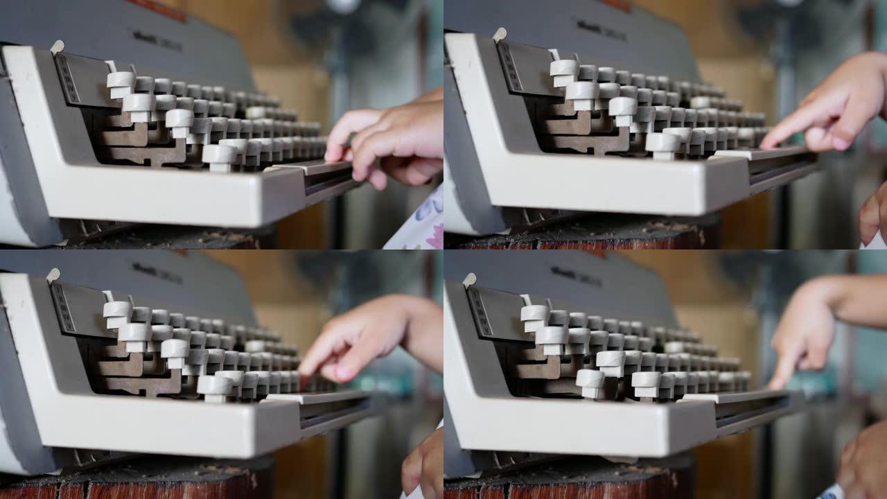 咖啡馆里可爱的小女孩在老式打字机上打字的侧视图。