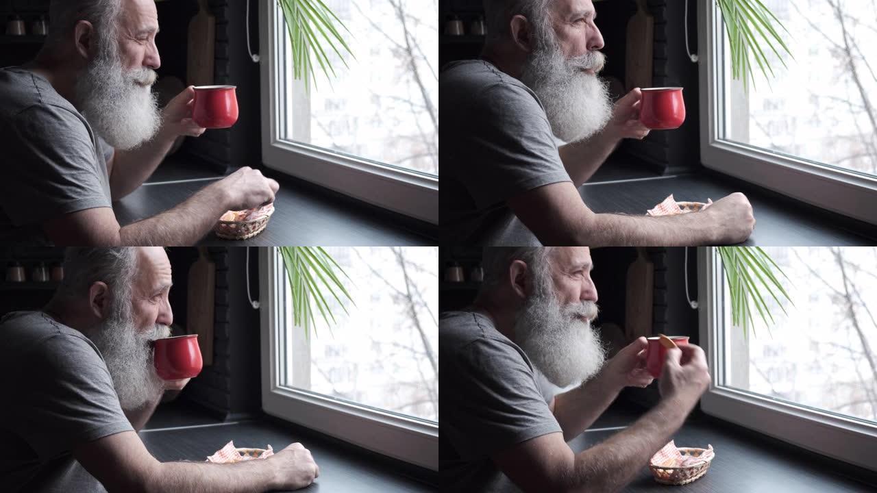 大胡子白发老人在厨房吃早餐