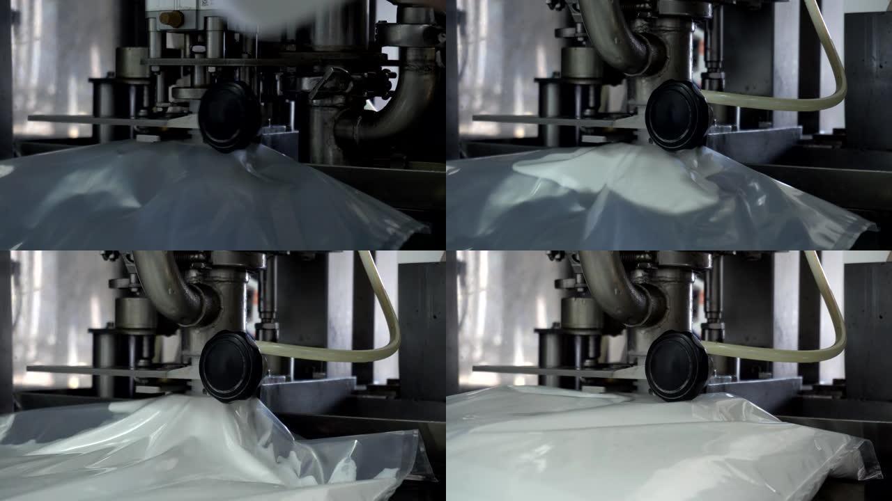 糖果行业，行业，背景中灌装和装瓶饮用酸奶和奶油的自动过程。工艺流程、生产
