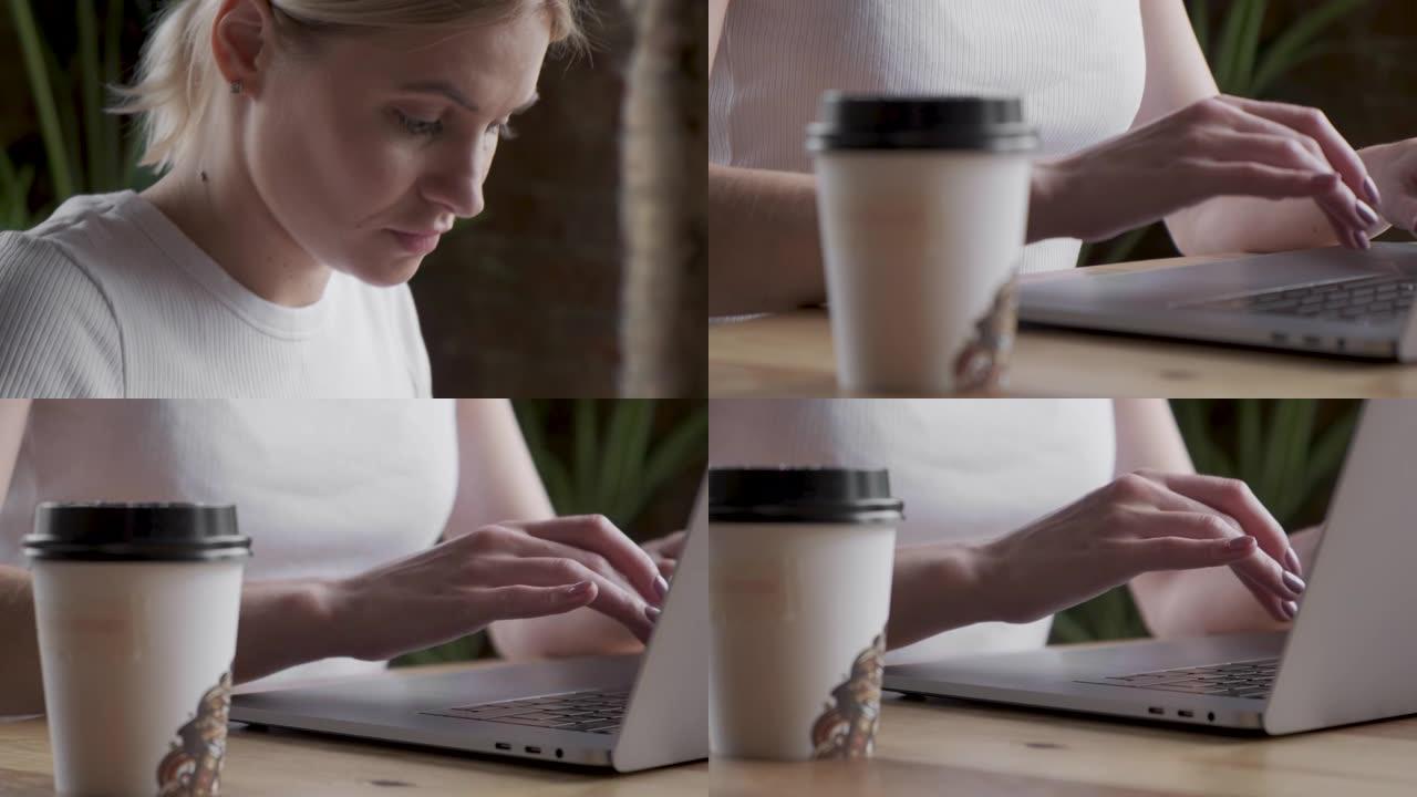 4k女性手型笔记本电脑键盘触摸触摸板，手指智能手机靠近特写。在家自由工作的无脸女人在社交网络上发表评