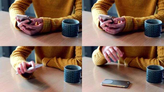 女人担心过度使用社交媒体将手机放在桌子上