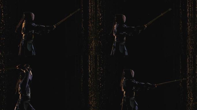 日本剑道战士的侧视图，用竹剑和传统服装在雨滴中的黑色背景下进行训练。特写。慢动作