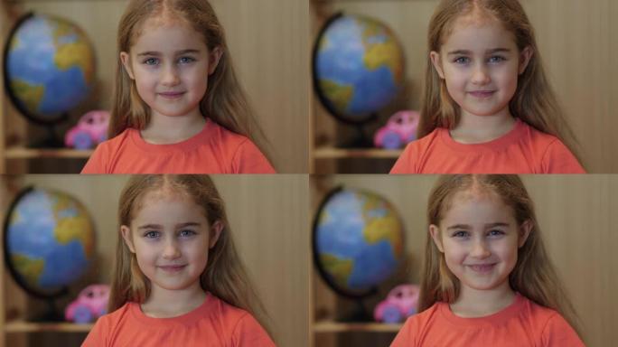 特写镜头小女孩7岁的肖像。脸部肖像特写。女学生小孩看着相机，面带微笑。可爱的聪明积极友好的小学生。