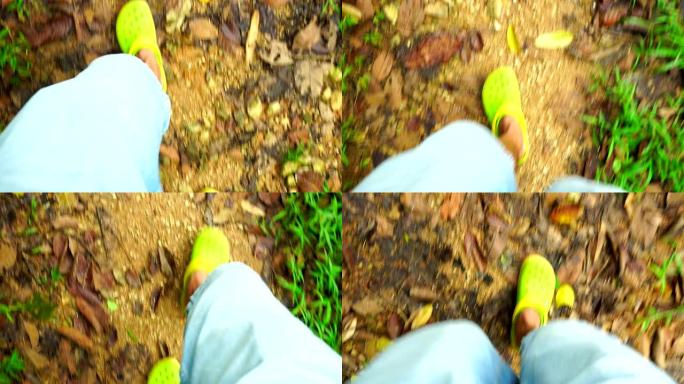 在森林中行走的人腿的特写镜头