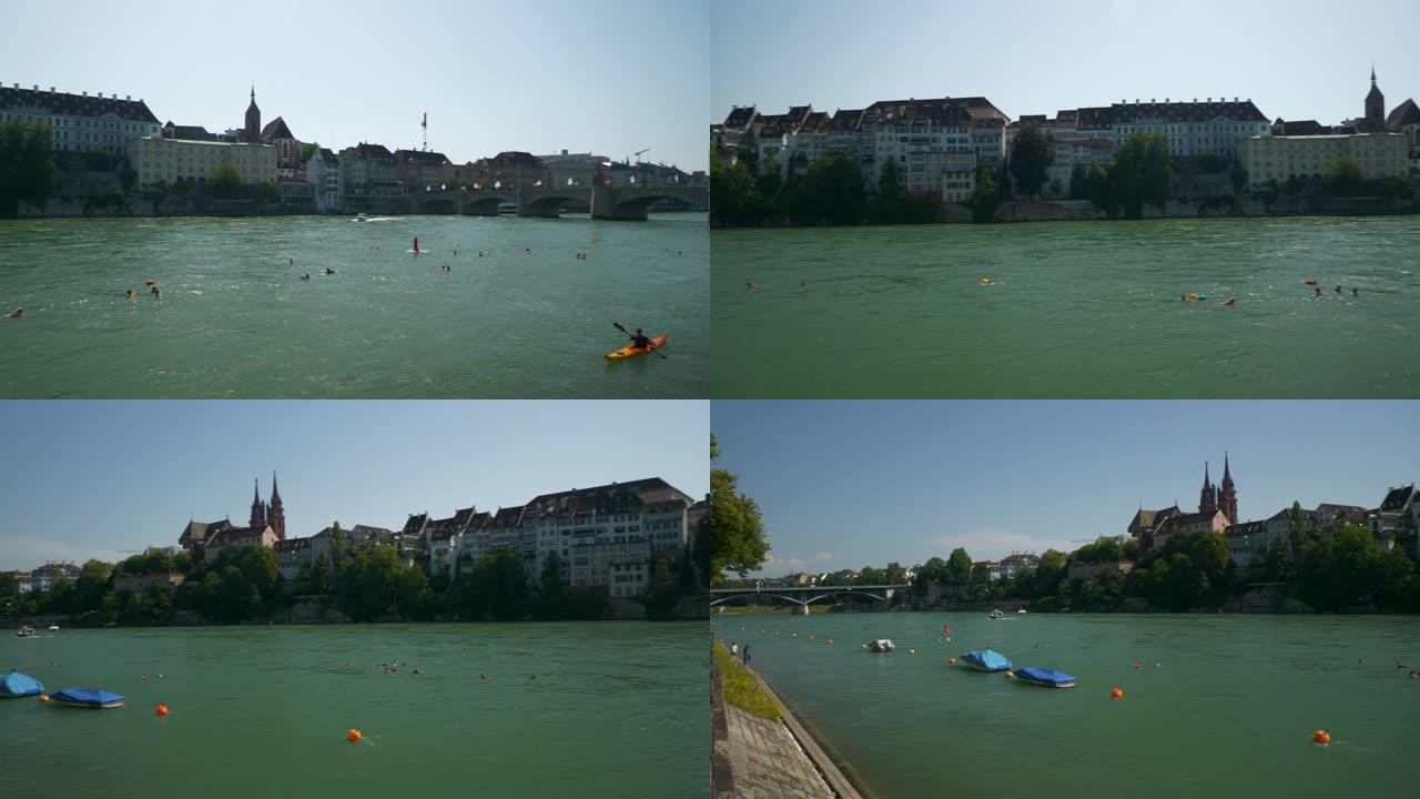 巴塞尔市中心晴天河拥挤游泳区慢动作全景4k瑞士