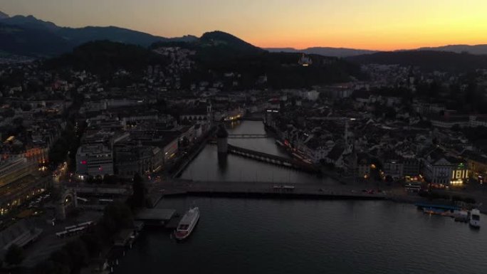 日落天空夜光卢塞恩市中心运河湾交通桥空中全景4k瑞士