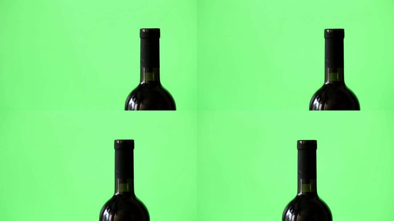 绿色背景上的一瓶葡萄酒，相机移动小车，绿色屏幕