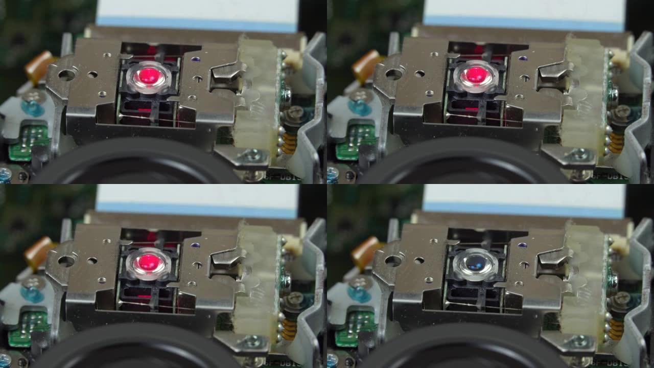 DVD驱动器中的激光亮起红色。发动机旋转。