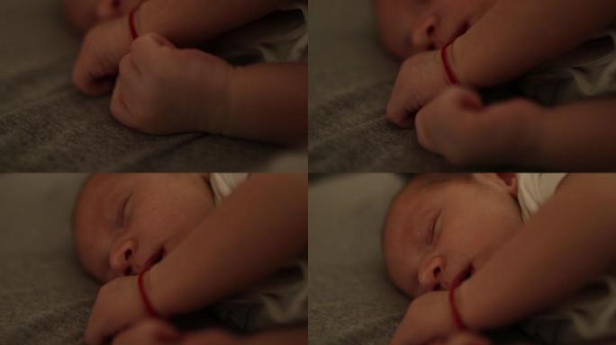 婴儿婴儿在婴儿床上睡觉的第一天婴儿睡觉，小男孩，睡觉