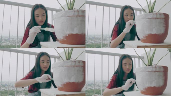 泰国年轻女子绘画树盆-股票视频