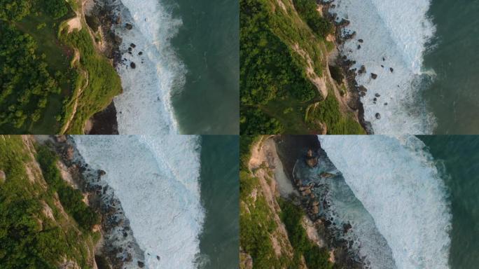 普拉乌鲁瓦图悬崖的景观。波浪在多岩石的海岸破裂。海景，岩石，海洋。