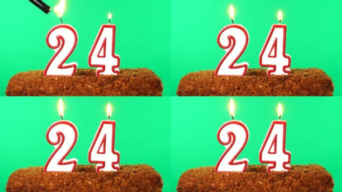 用24号点燃蜡烛的蛋糕。色度键。绿屏。隔离