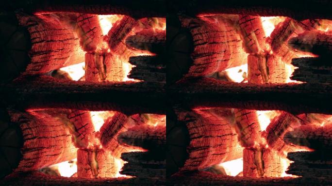 大型篝火燃烧的特写镜头，篝火堆的木头