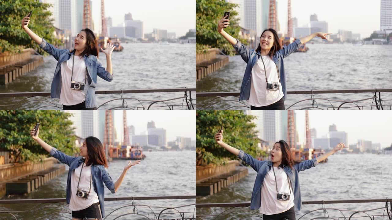 美丽的亚洲女人自拍视频聊天与她的朋友分享享受暑假在泰国曼谷旅行。