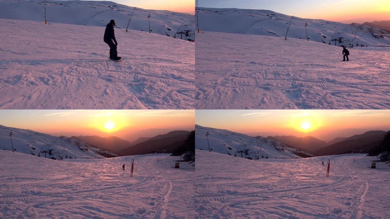 4K.一名滑雪者从雪中升起，从山上滑下，日落-阿德里安。