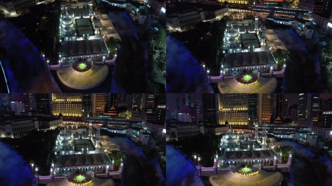 吉隆坡市中心著名的生命湾河穿越夜间照明航空全景4k马来西亚