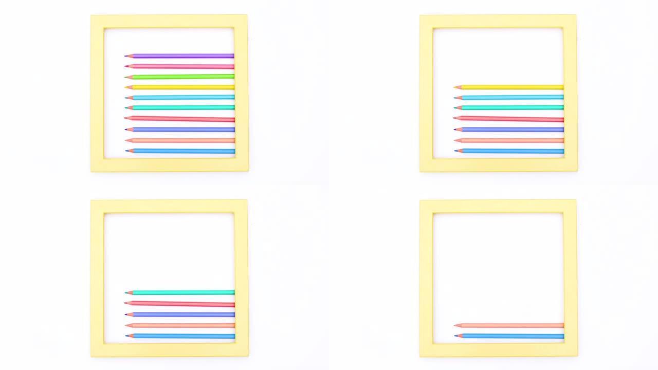 彩色蜡笔出现在白色主题的黄色框架内。停止运动