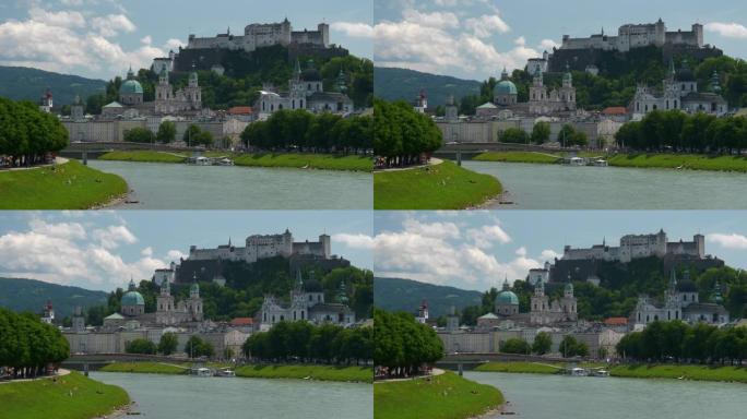 夏季萨尔茨堡市中心河畔慢动作全景4k奥地利