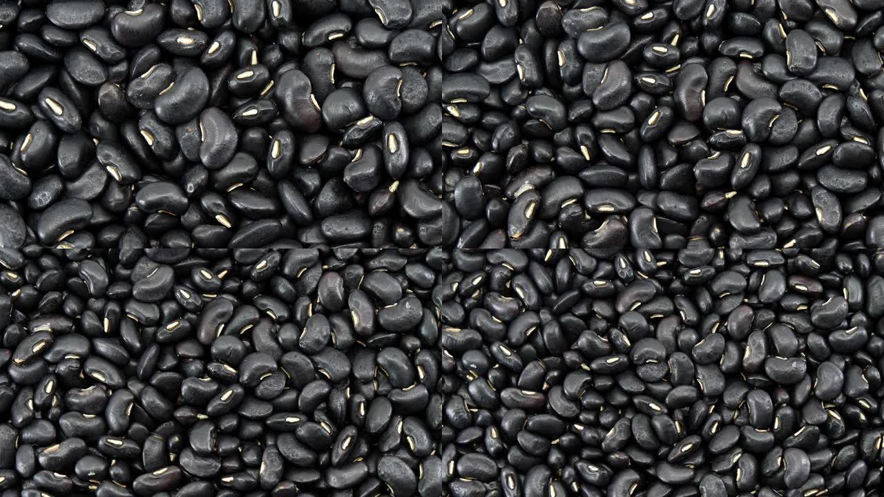 生黑豆种子食品有机俯视图质地，富含钙，有助于维护骨骼和牙齿，补充食品，蛋白质健康食品，视频录像。