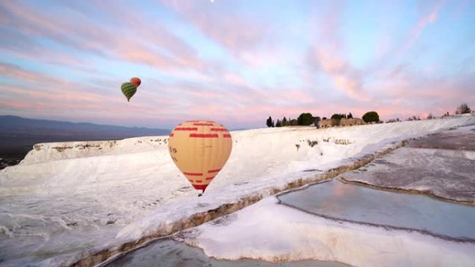 Hot air balloons in travertine pools lime terraces