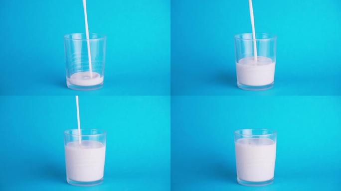 在蓝色背景上装满一杯牛奶。充填和富含钙的概念。流行背景上的牛奶。