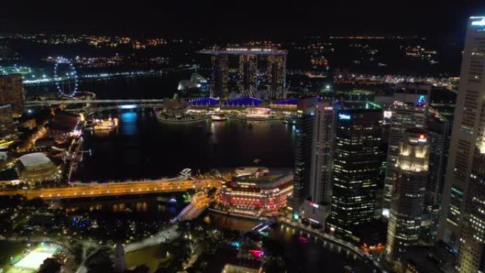 新加坡市区夜间照明滨海湾酒店空中全景4k