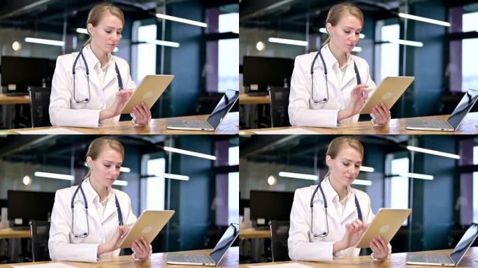 勤劳的年轻女医生在办公室使用平板电脑
