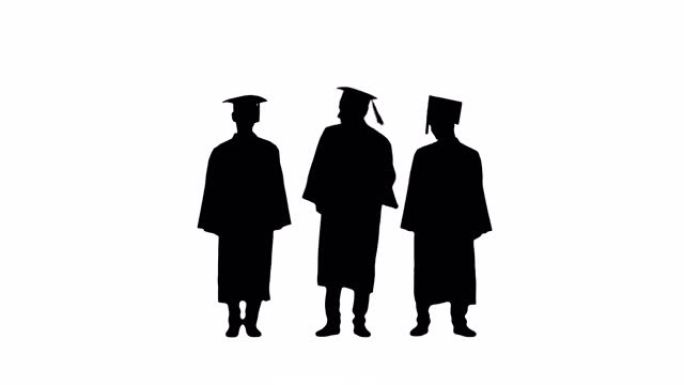 剪影三名穿着毕业长袍和砂浆板的男学生在等待时热身