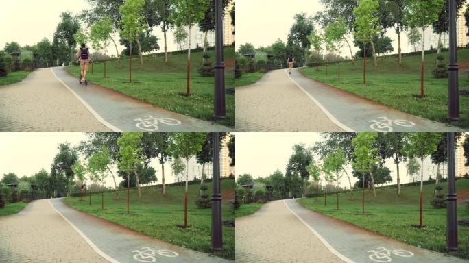 生态主题，新型个性化智能交通电动推代步车。高加索人沿着自行车道骑着一辆环保踏板车穿过城市公园。男性骑