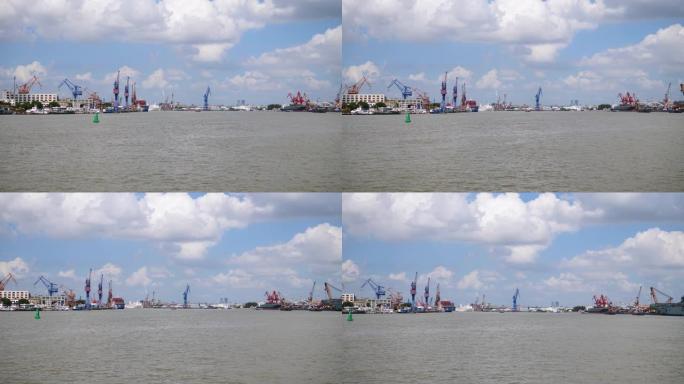 上海城市风景，黄浦江两岸的起重机和码头，晴天阴天从渡船上看，4k镜头。