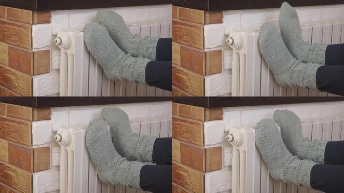 暖气片上的保暖袜子。