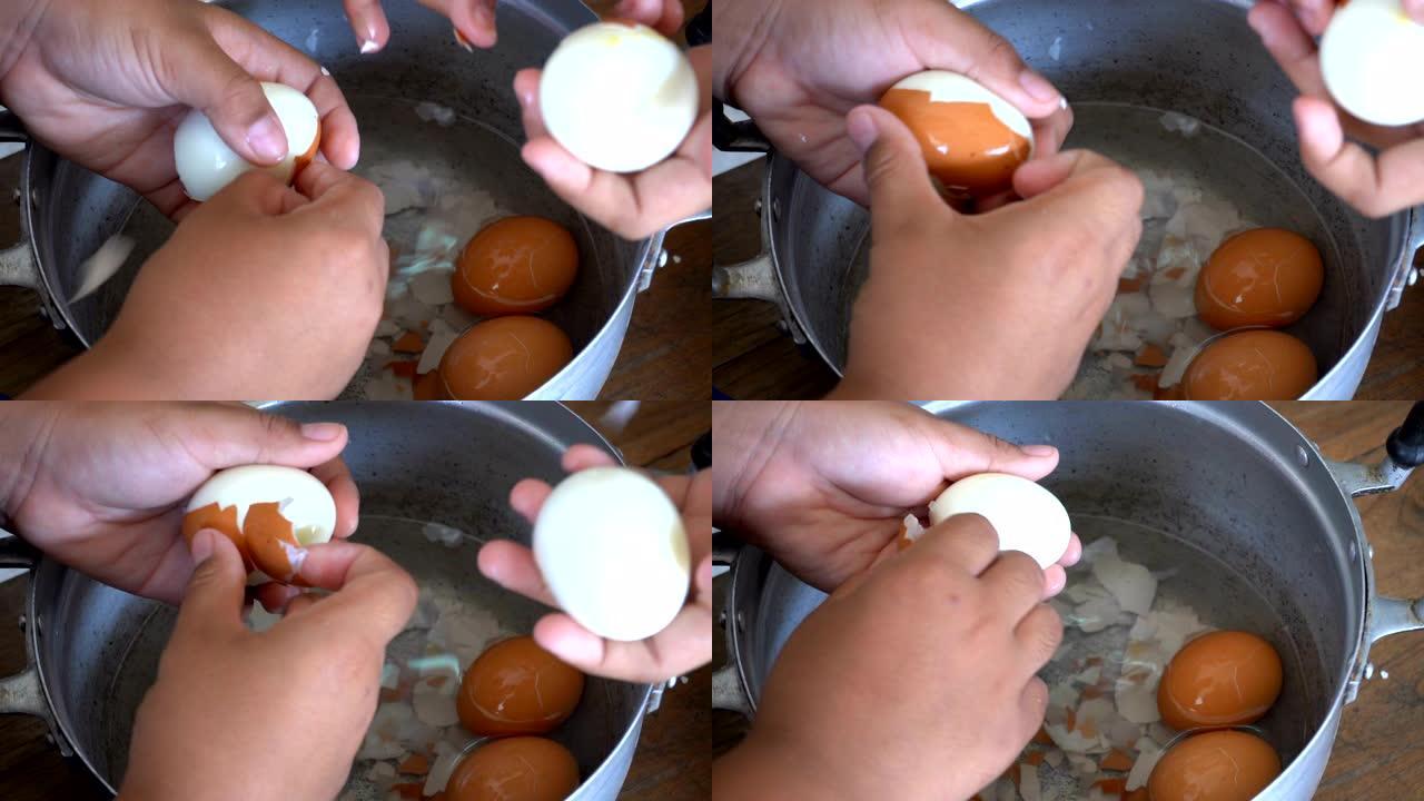 儿童剥煮鸡蛋剥鸡蛋特写视频素材